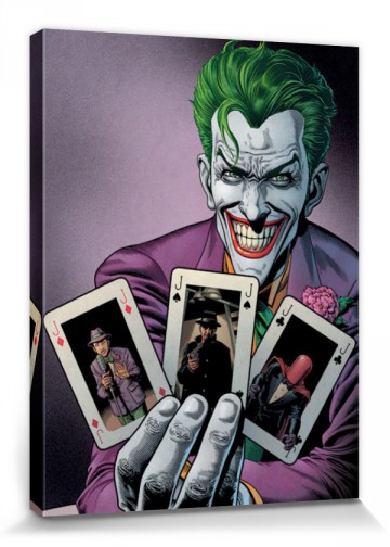 Jokeri pitelemässä pelikortteja